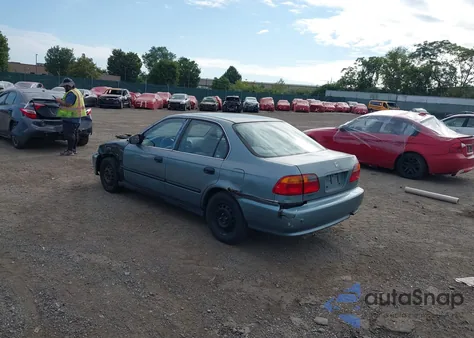 2000 Honda Civic Lx from USA, damaged, VIN 2HGEJ6674YH586933